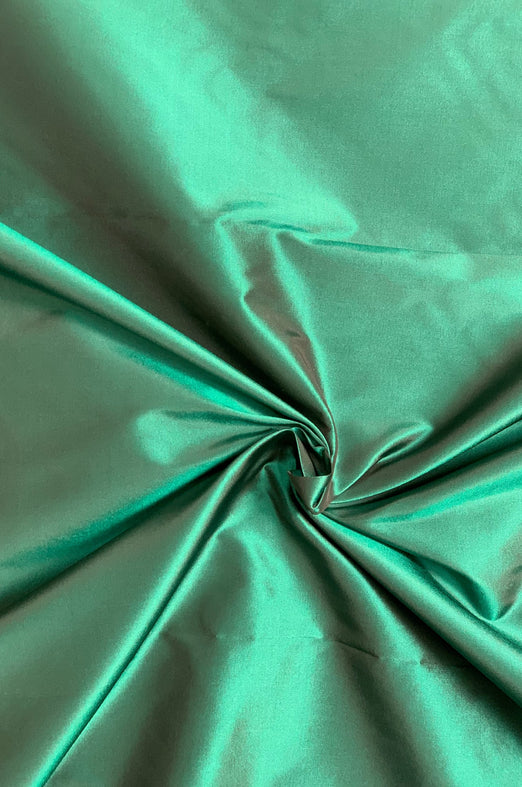 Iridescent Pool Green/Plum Taffeta Silk Fabric